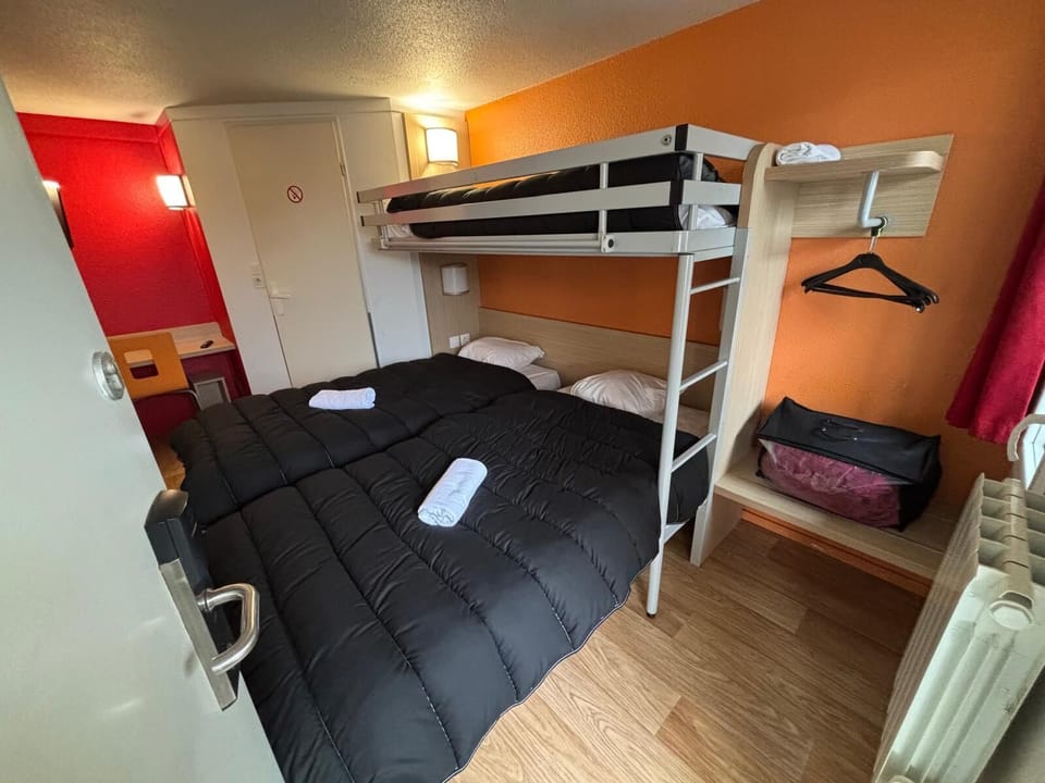 Standard Triple Room | Desk, laptop workspace, blackout drapes, iron/ironing board