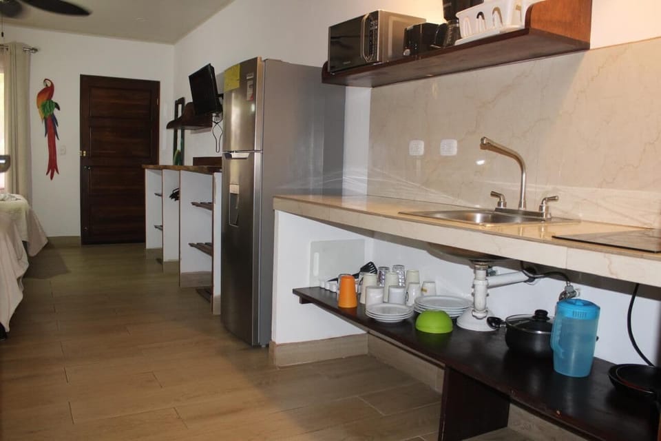 Family Studio Suite, 1 Bedroom | Private kitchen | Fridge, freezer