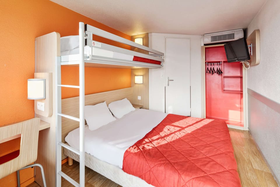 Standard Room, Multiple Beds (1 Double and 1 Single bed) | Desk, blackout drapes, soundproofing, free cribs/infant beds