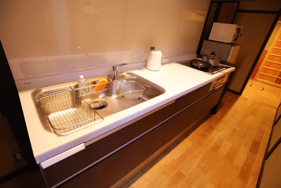 Japanese Style Townhouse (Beds + Futons) | Private kitchen | Full-size fridge, microwave, stovetop, electric kettle