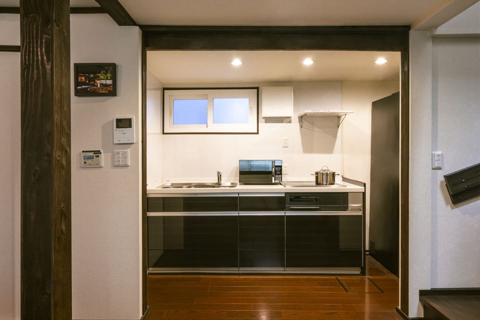 Japanese Style Townhouse | Private kitchen | Fridge, microwave, stovetop, espresso maker