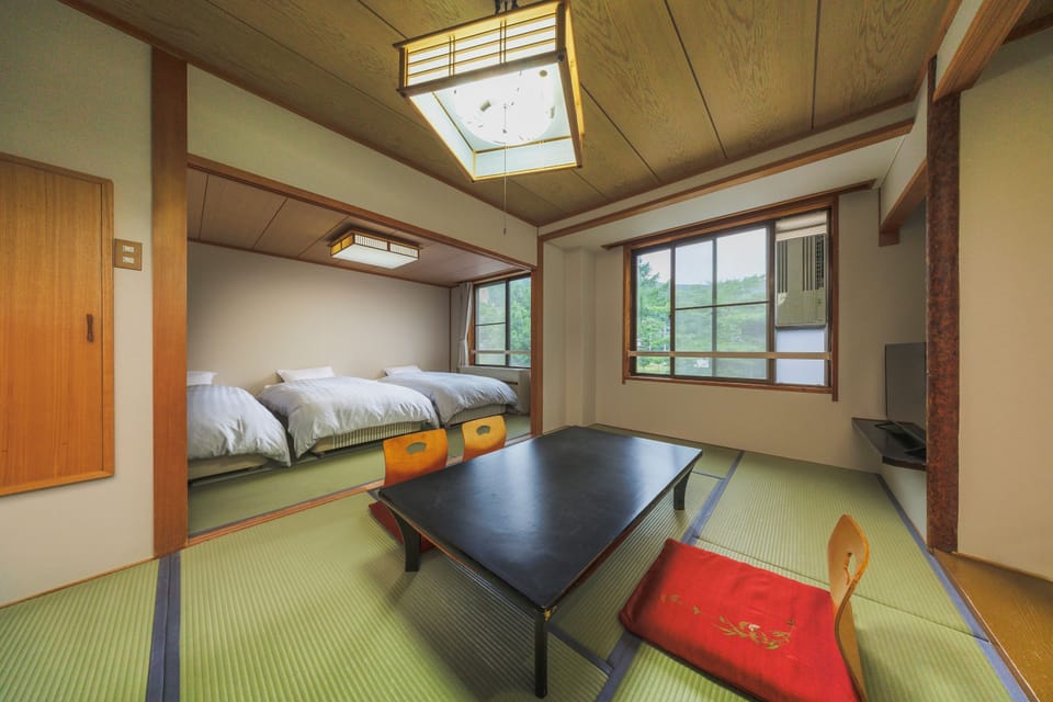 Superior Triple Room, Non Smoking, Mountain View | In-room safe, bed sheets