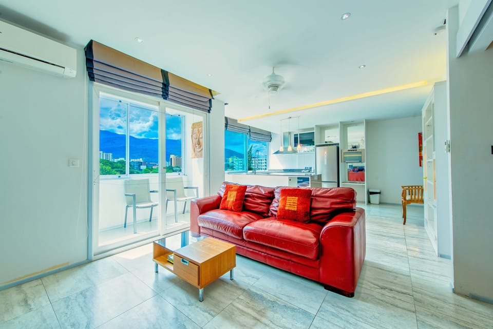 Exclusive Suite, 2 Bedrooms, Mountain View | Living area | Flat-screen TV, Netflix, DVD player