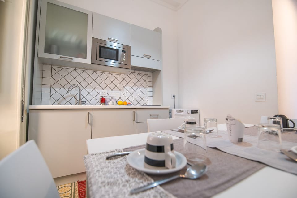 Classic Room, 1 Bedroom, Non Smoking, City View | Private kitchen | Fridge, dining tables
