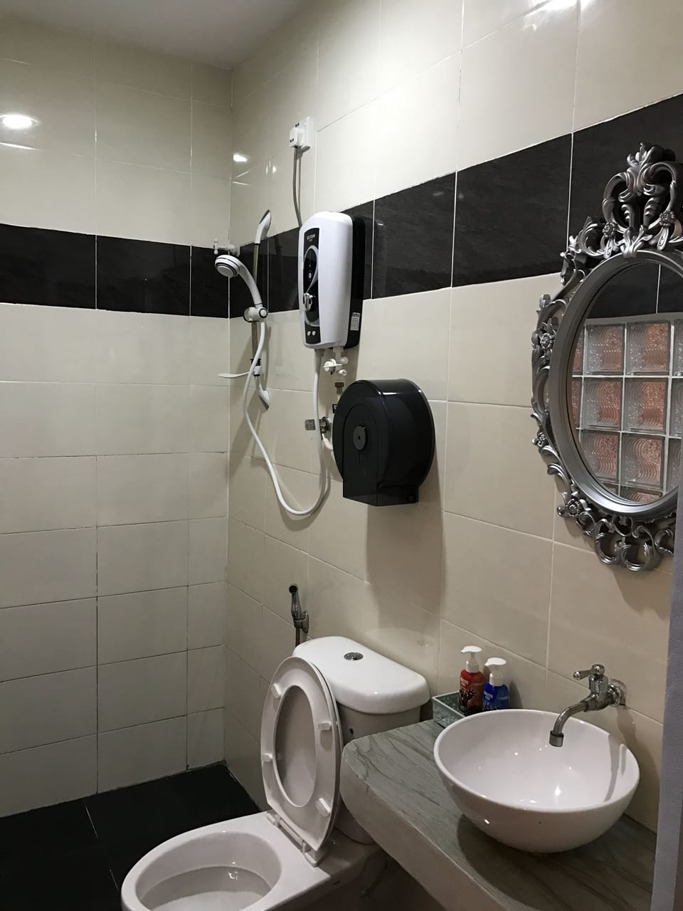 Shower, free toiletries, hair dryer, slippers