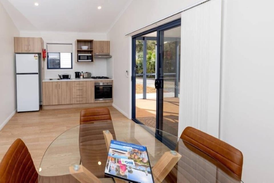 Deluxe Balcony 2 Bedroom Villa | Living area | Flat-screen TV, table tennis, books