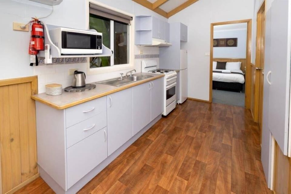 Standard 2 Bedroom Villa | Private kitchen | Shared fridge, microwave, oven, stovetop
