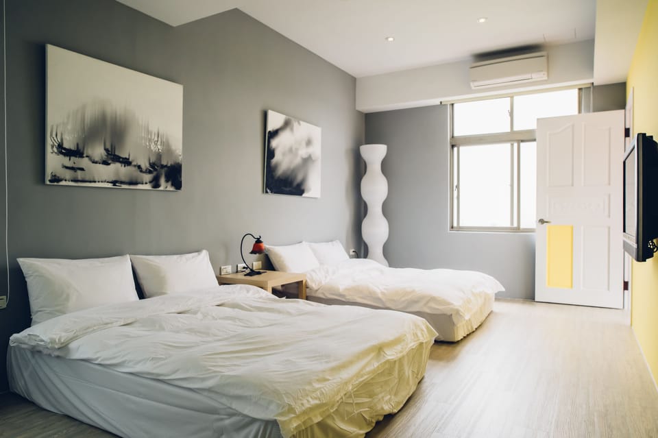 Family Room | Premium bedding, down comforters, pillowtop beds, blackout drapes