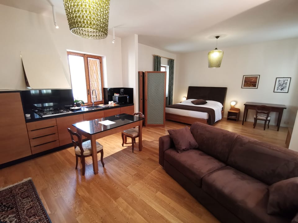 Deluxe Studio Suite, 1 Bedroom, Balcony, Vineyard View | Free minibar items, individually decorated, individually furnished