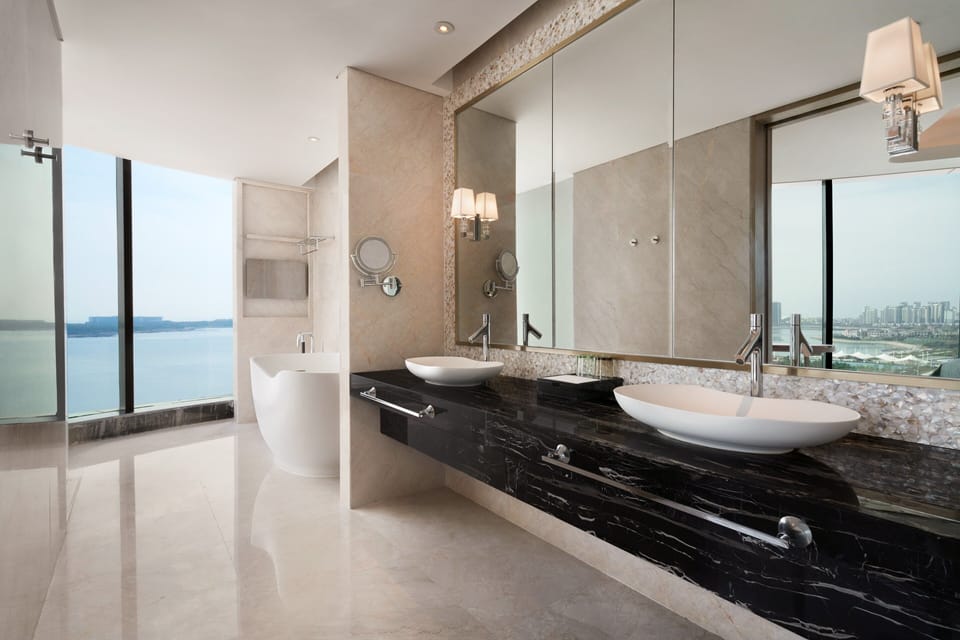 Club Suite, 1 Bedroom, Ocean View | Bathroom | Separate tub and shower, designer toiletries, hair dryer, bathrobes