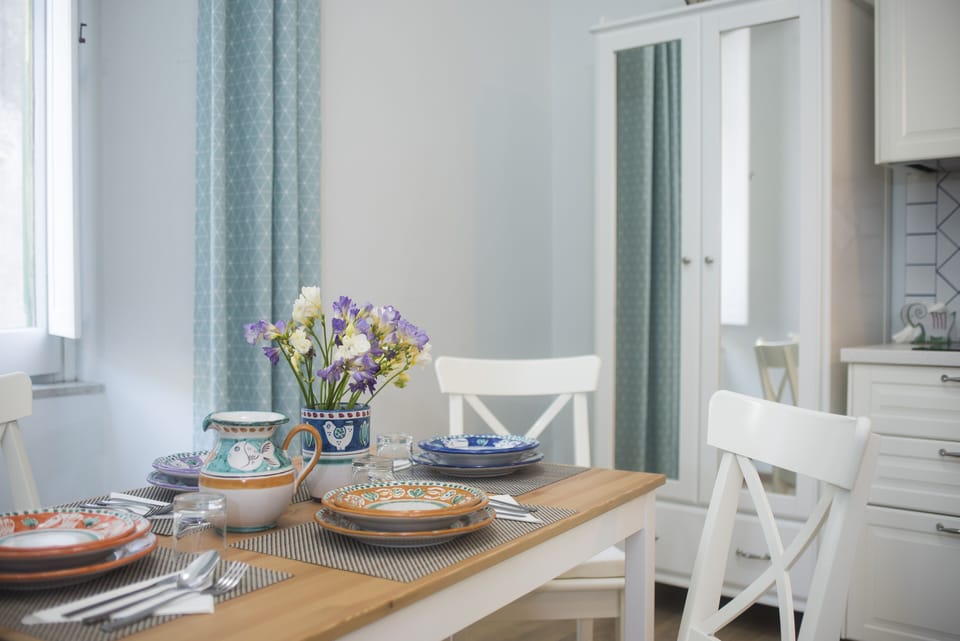 Family Condo, 1 Bedroom, City View | Living area | 40-inch flat-screen TV with digital channels, TV