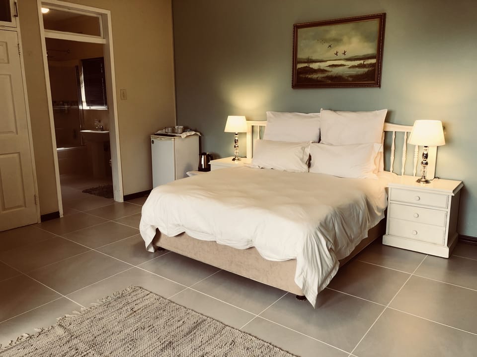 Deluxe Room | Premium bedding, blackout drapes, iron/ironing board (on request), WiFi