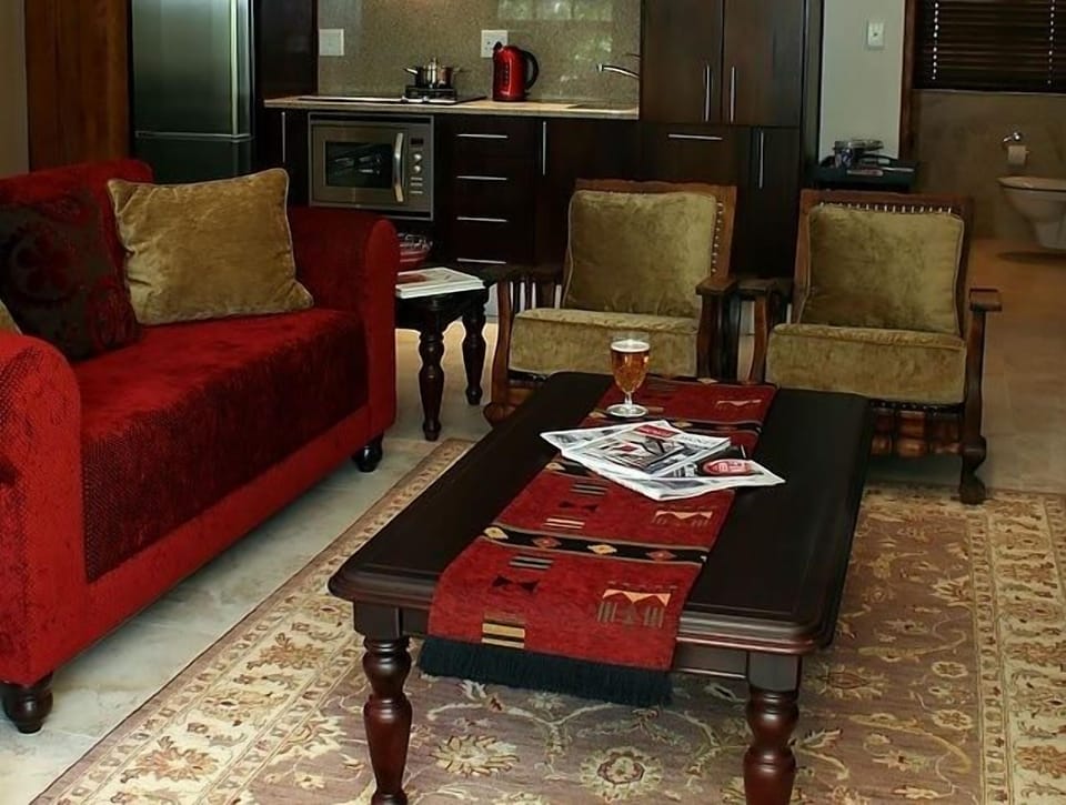 Luxury Suite, 1 Bedroom (Pinotage Suite) | Living area | 48-cm flat-screen TV with satellite channels, TV, DVD player