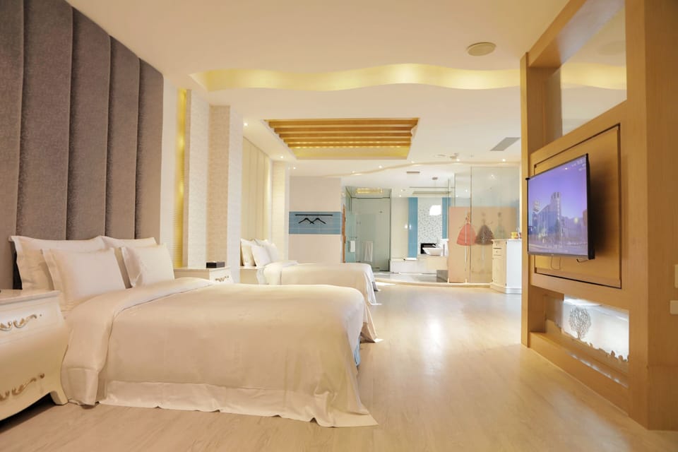 VIP Quadruple Room | Down comforters, pillowtop beds, minibar, individually decorated