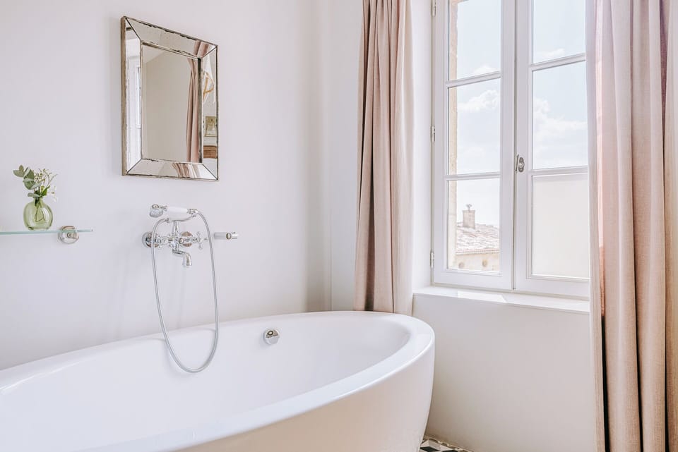 Combined shower/tub, free toiletries, hair dryer, bathrobes