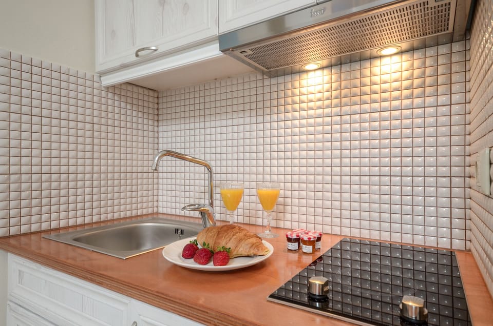 Apartment | Private kitchenette | Full-size fridge, stovetop, coffee/tea maker, electric kettle