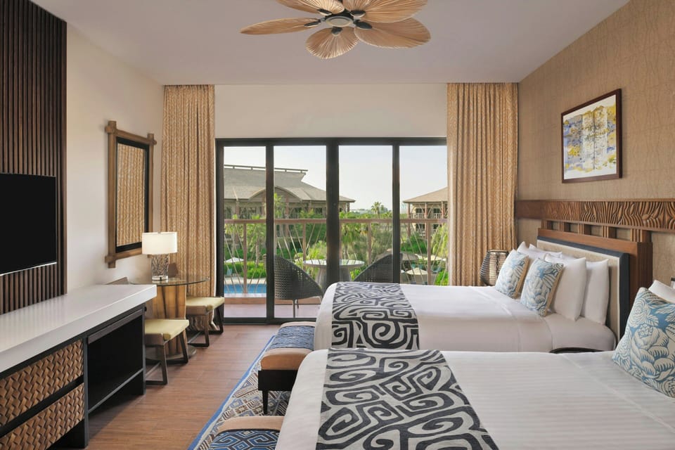Hypo-allergenic bedding, pillowtop beds, in-room safe