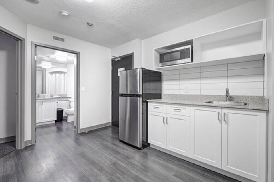 Suite, 2 Bedrooms, Kitchenette | Private kitchen | Full-size fridge, microwave