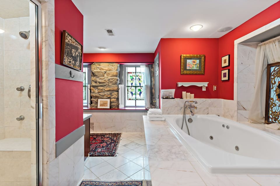 Luxury Suite, 1 King Bed, Hot Tub, Garden View | Deep soaking bathtub