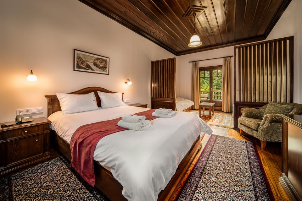 Quadruple Room, Ground Floor | Minibar, individually decorated, individually furnished, desk