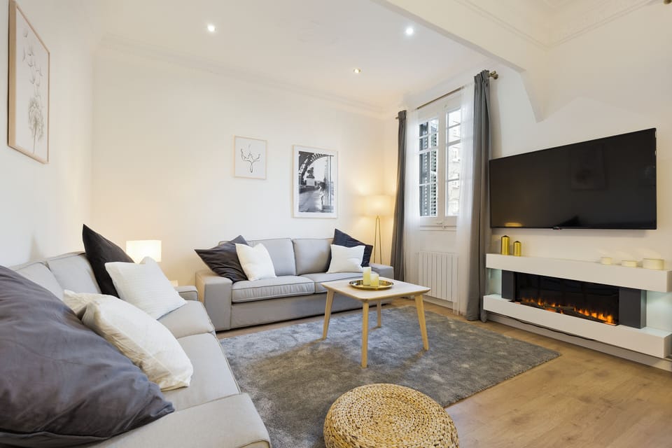 Basic Apartment, 3 Bedrooms | Living area | Flat-screen TV, DVD player