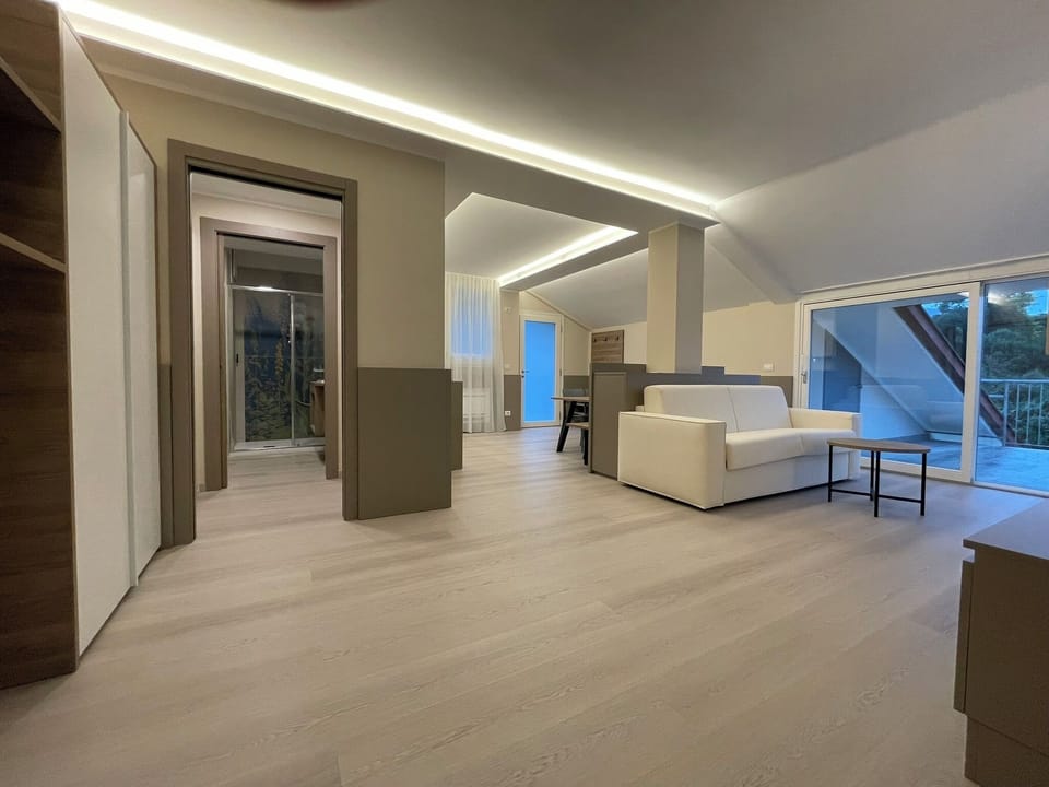 Premium Apartment | Living area | 15-inch TV with satellite channels