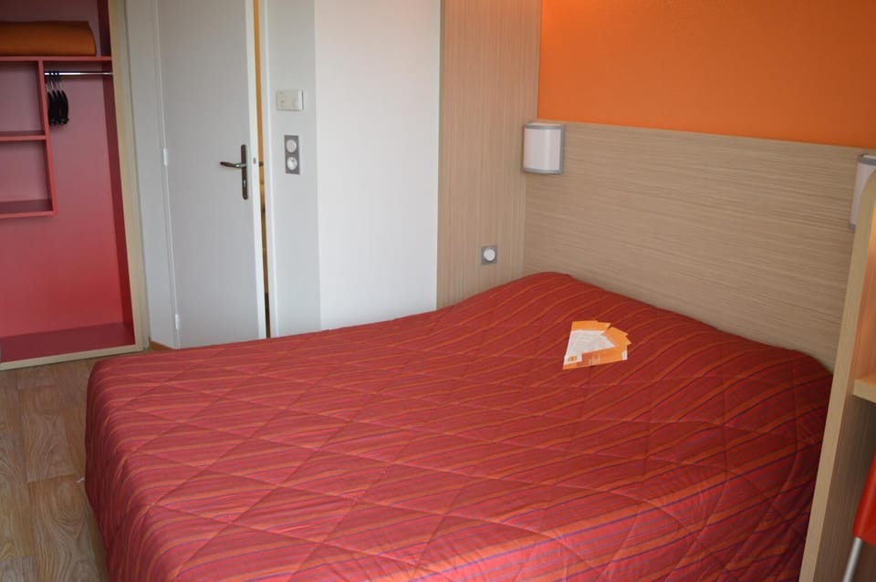 Desk, blackout drapes, soundproofing, iron/ironing board