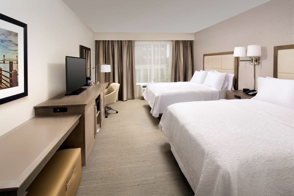 Premium bedding, down comforters, in-room safe, desk