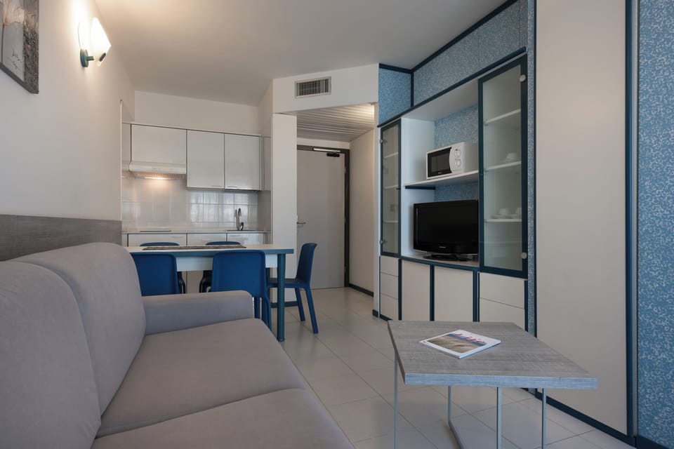 Apartment, Balcony | Private kitchen | Mini-fridge, microwave, stovetop, highchair