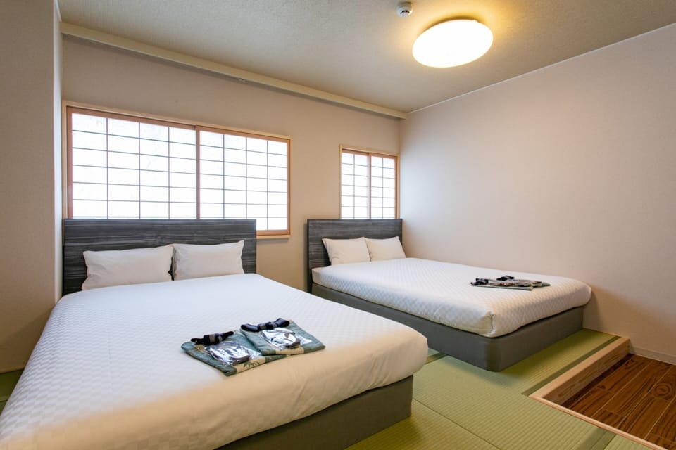 Japanese & Western Family Room,2 Double Beds | Laptop workspace, blackout drapes, iron/ironing board (on request)