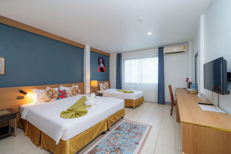 Deluxe Family Room | In-room safe, desk, WiFi (free), bed sheets
