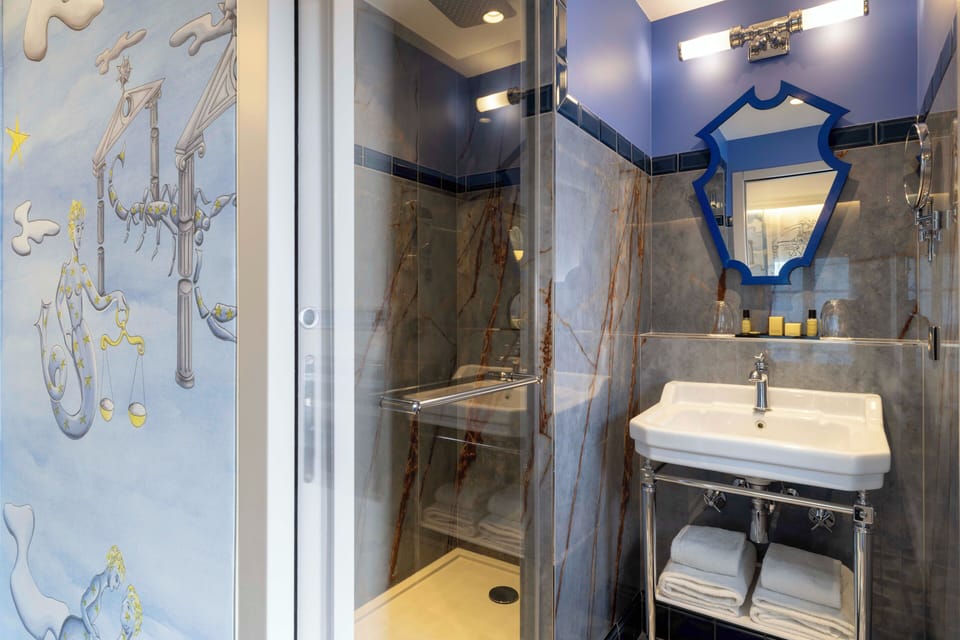 Eco-friendly toiletries, hair dryer, slippers, towels
