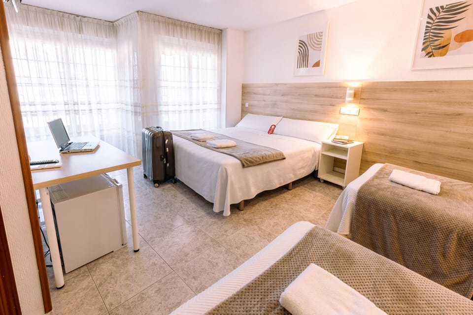 Family Quadruple Room | In-room safe, blackout drapes, free WiFi, bed sheets