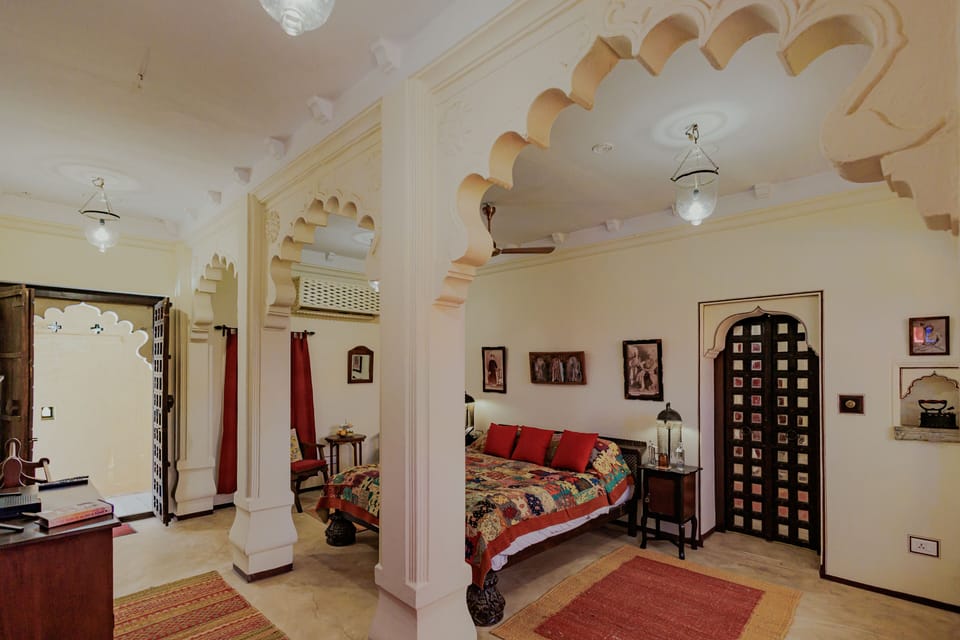 Grand Heritage Suite | Minibar, in-room safe, desk, laptop workspace