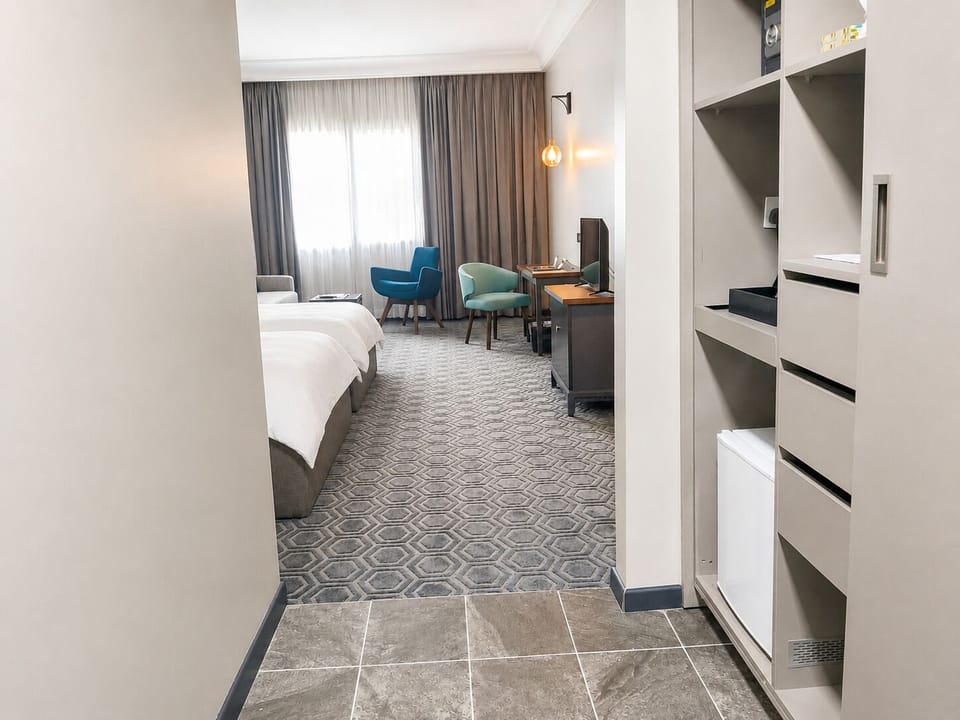 Memory foam beds, minibar, in-room safe, desk