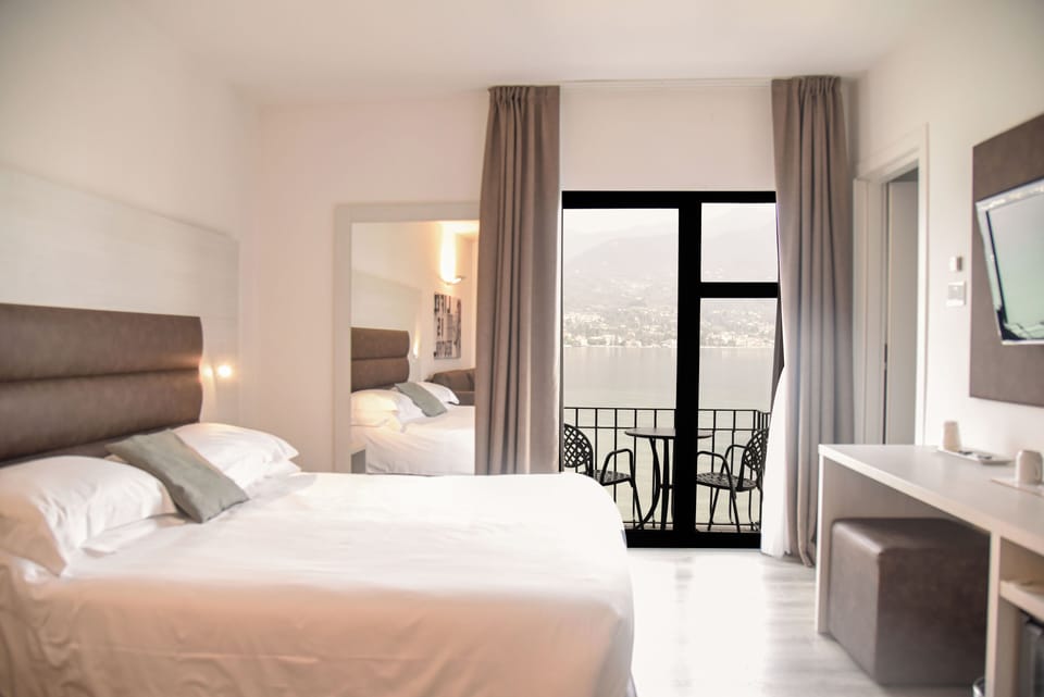 Deluxe Double or Twin Room, Balcony, Lake View | Premium bedding, down comforters, minibar, in-room safe