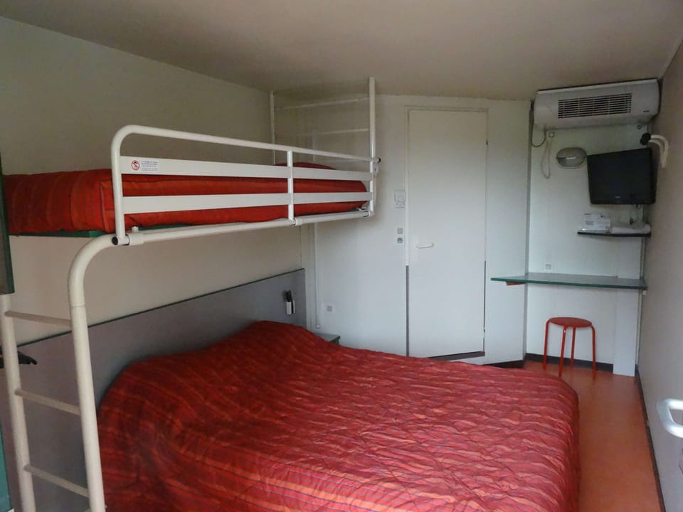 Desk, blackout drapes, soundproofing, iron/ironing board