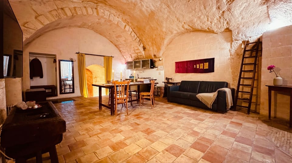Superior Studio Suite | Living area | Flat-screen TV
