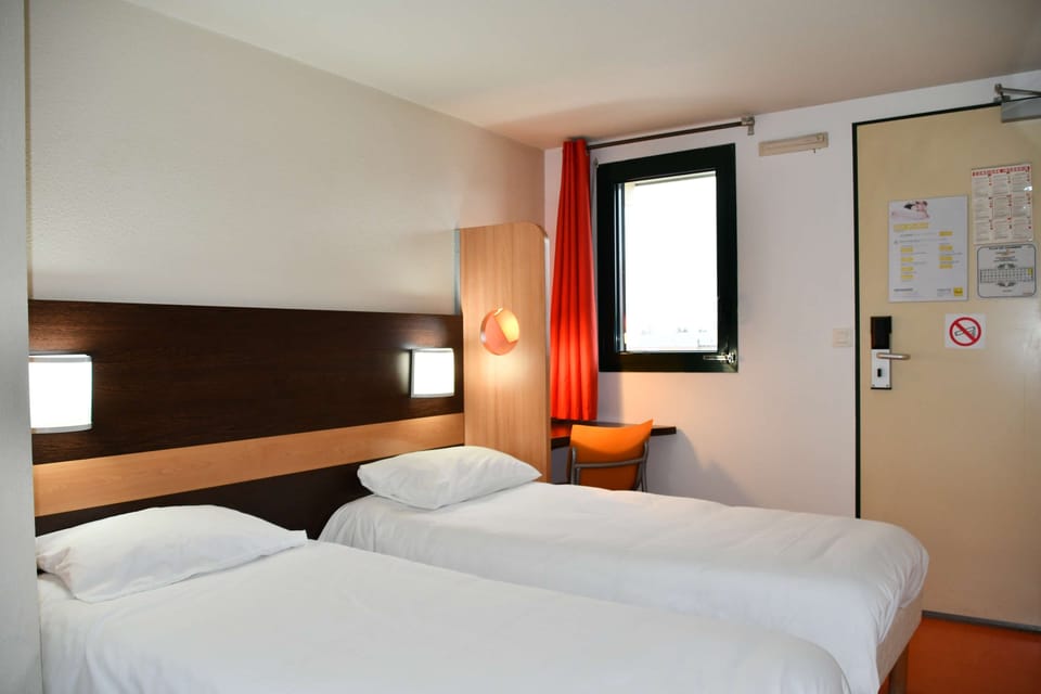 Standard Room, 2 Twin Beds | Desk, blackout drapes, iron/ironing board, free cribs/infant beds