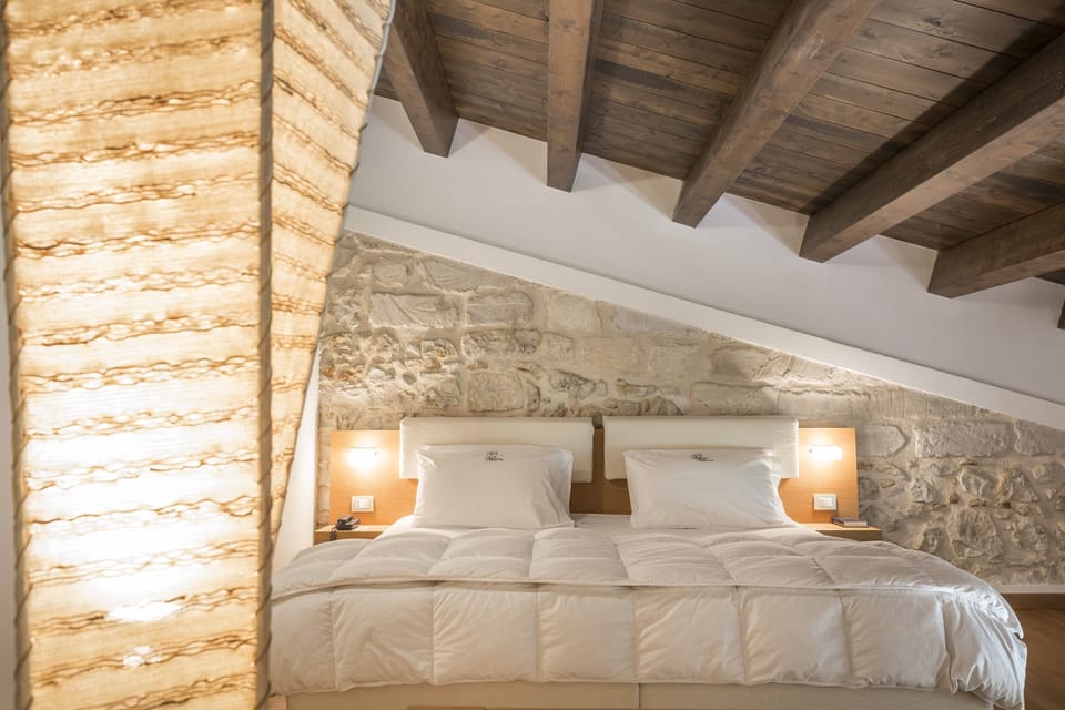 Family Triple Room | Hypo-allergenic bedding, in-room safe, desk, laptop workspace