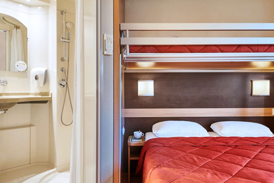 Standard Room, Multiple Beds (1 Double and 1 Single bed) | Desk, blackout drapes, free cribs/infant beds, free WiFi