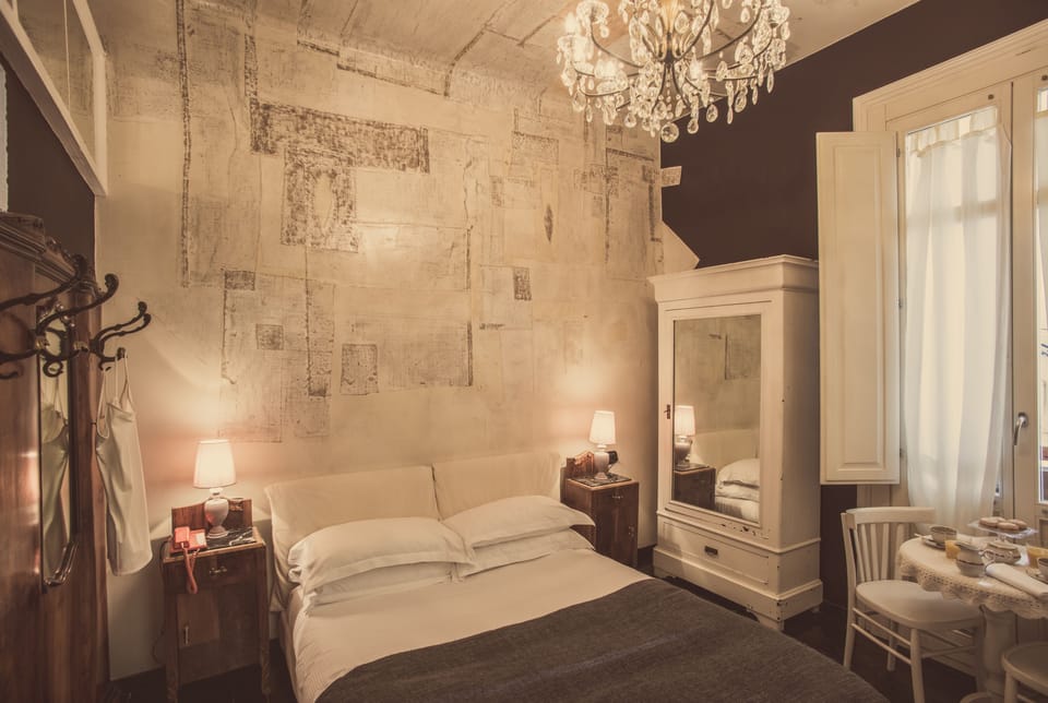 Superior Room | 1 bedroom, down comforters, minibar, in-room safe