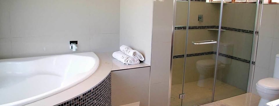 Comfort Room (Bridal Suite) | Bathroom | Hair dryer, towels, soap, toilet paper
