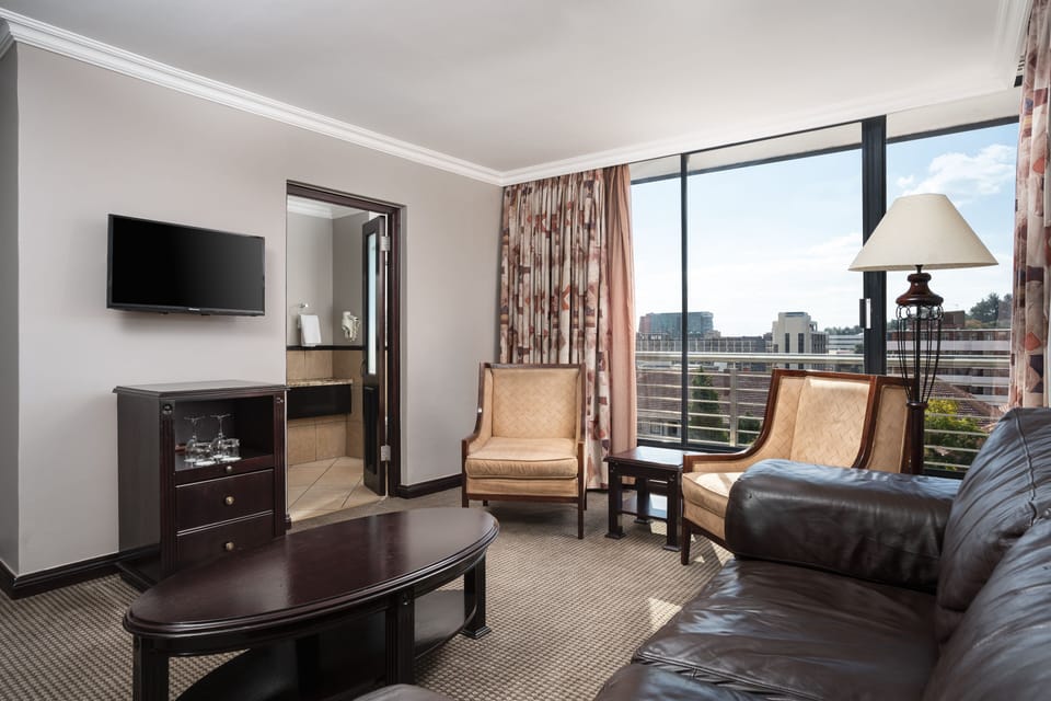 Suite, 1 King Bed | Premium bedding, down comforters, pillowtop beds, in-room safe