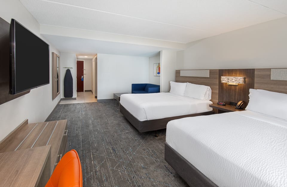 Suite, 2 Queen Beds, Accessible (Communications) | Desk, iron/ironing board, free cribs/infant beds, free WiFi