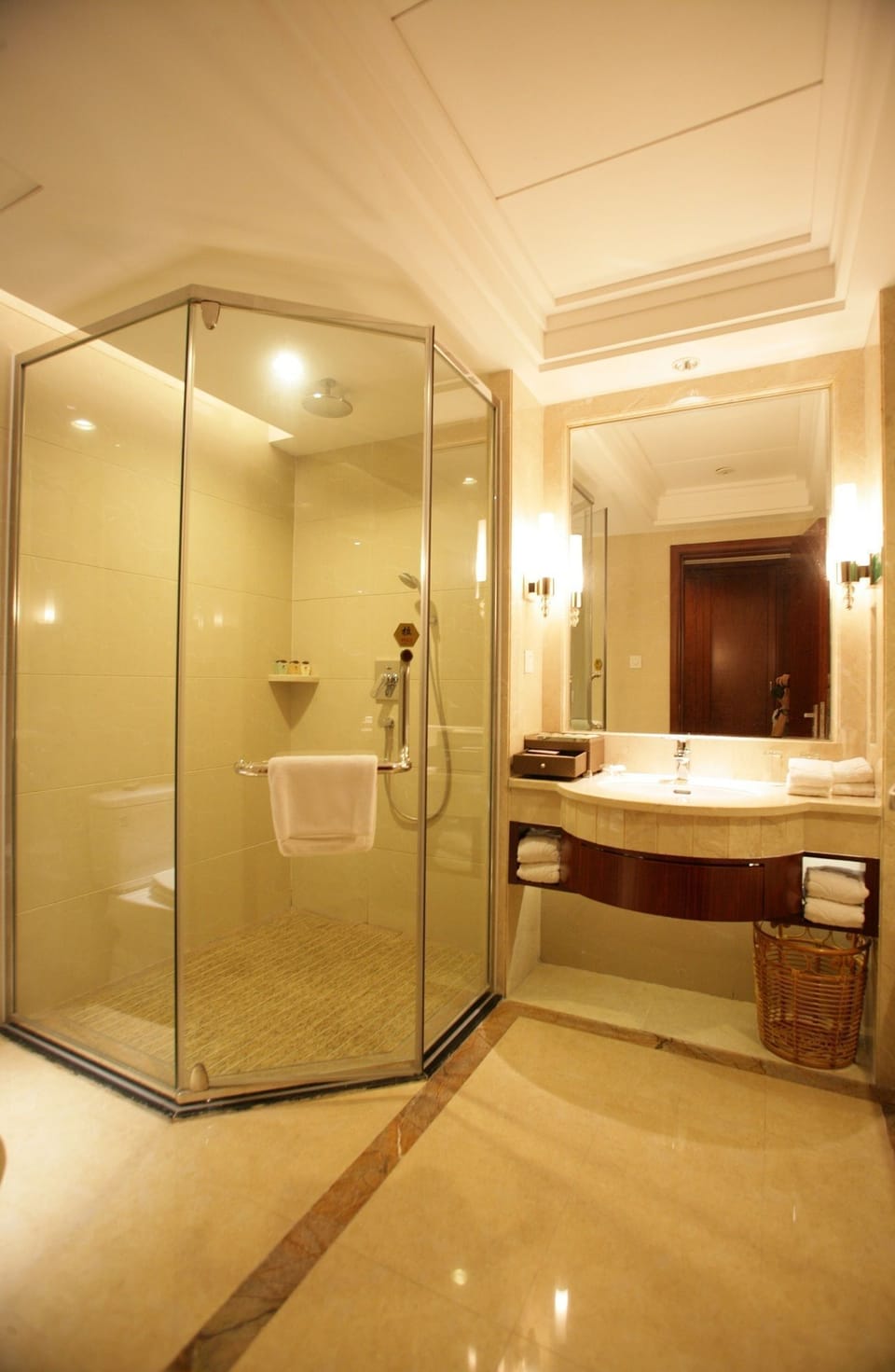 Separate tub and shower, rainfall showerhead, free toiletries