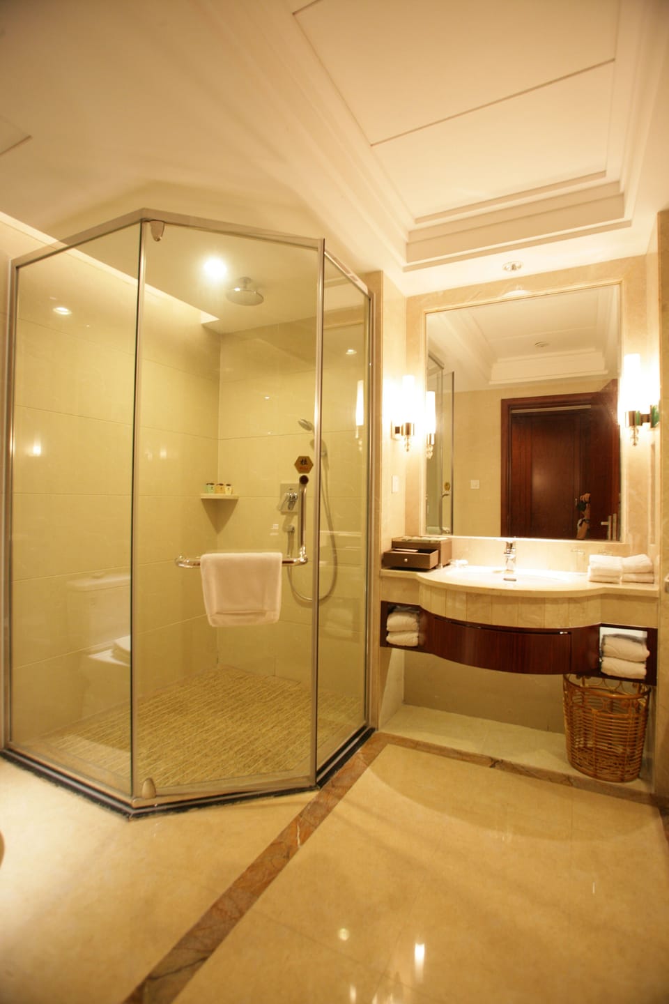 Separate tub and shower, rainfall showerhead, free toiletries