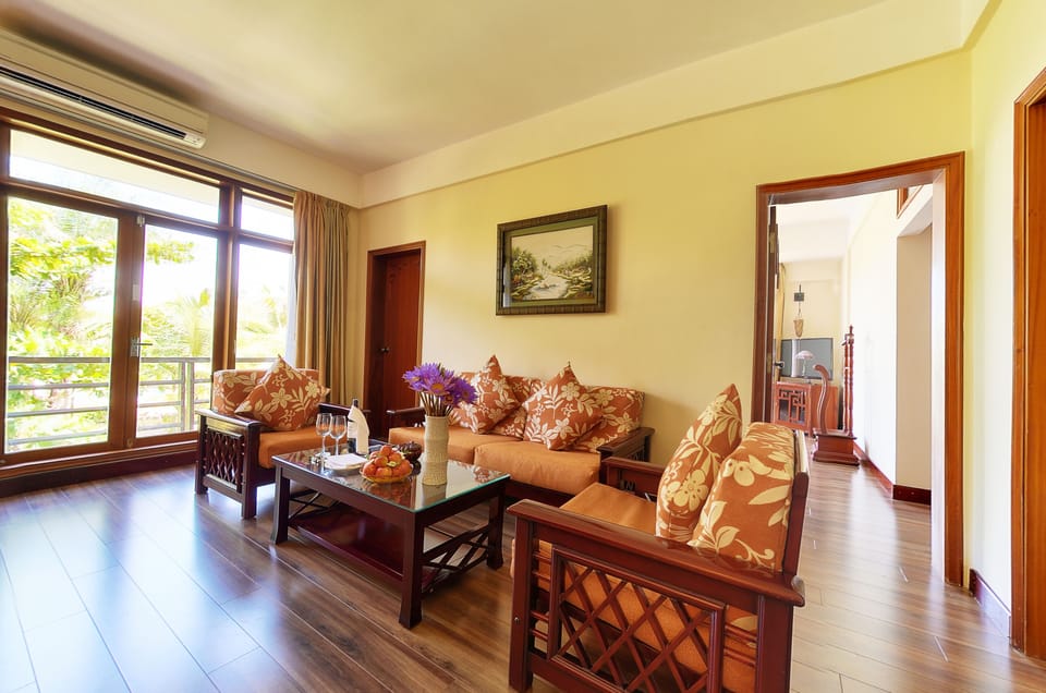 Suite, Ocean View | Minibar, in-room safe, desk, laptop workspace