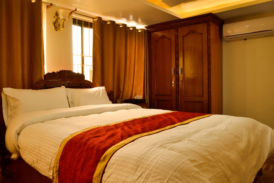 Deluxe Double or Twin Room, 2 Bedrooms, Accessible, Valley View | 2 bedrooms, minibar, in-room safe, individually decorated