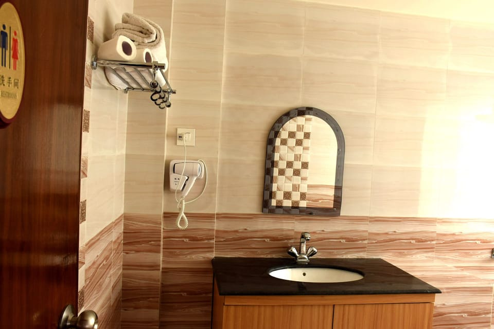 Shower, free toiletries, hair dryer, bathrobes